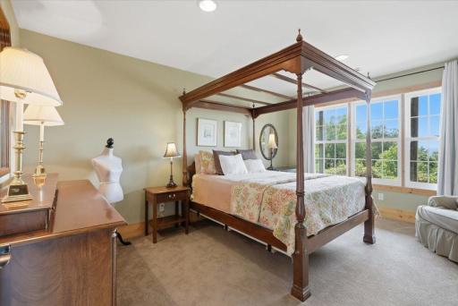Lower level (bedroom 3) with views of the lake and the pool