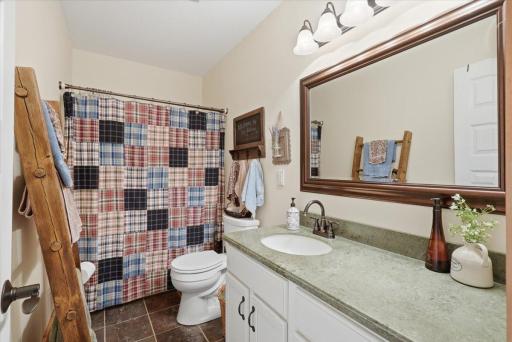 Bathroom 4, located near bedroom and family room in lower level