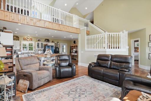 Open-concept to the kitchen, pantry and dining with the loft creating additional living spaces without compromising the views