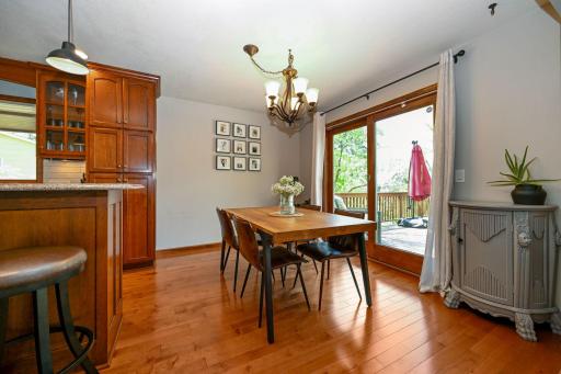 Spacious dining room steps out to the deck.