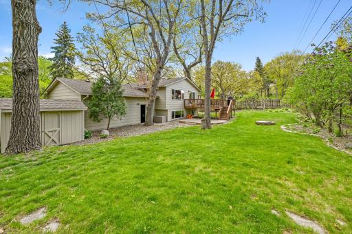 Nice sized yard with storage shed & firepit.