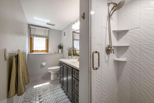 Updated 3/4 bath is conveniently located near both bedrooms.