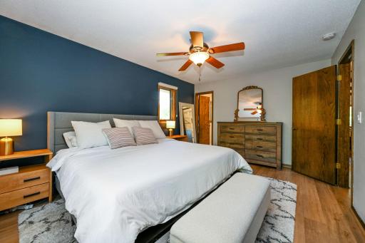 Primary bedroom has convenient access to the walk-through bath.