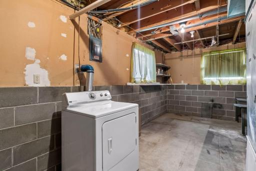 laundry / utility room. Propane furnace, water heater (7 years old) and water softener + room for storage