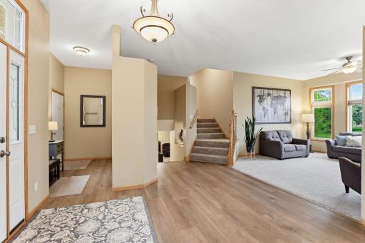 Large, Open Foyer with Newer LVP Flooring (2024) that Continues through much of the Main Level.
