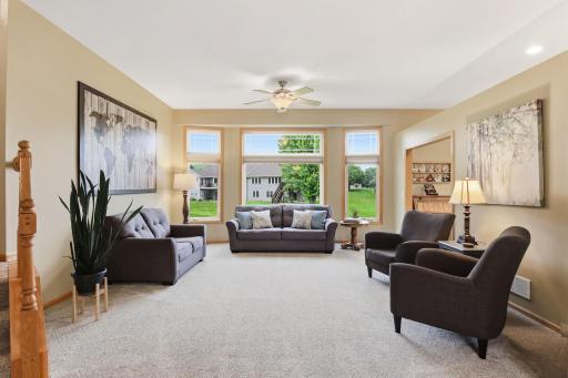 Large Living Room with Big Windows & Transom Windows that Let in Wonderful Natural Light.