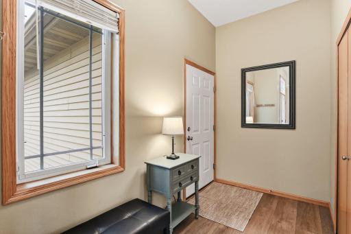 Front Entrance off the Garage with LVP Flooring and Large Front Closet.