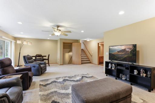Large Family Room with Lookout Windows & Recessed Lights.