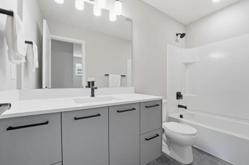 Second bathroom on the upper level. Bubble baths await!