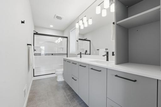 Dual vanity, storage GALORE, walk-in shower.