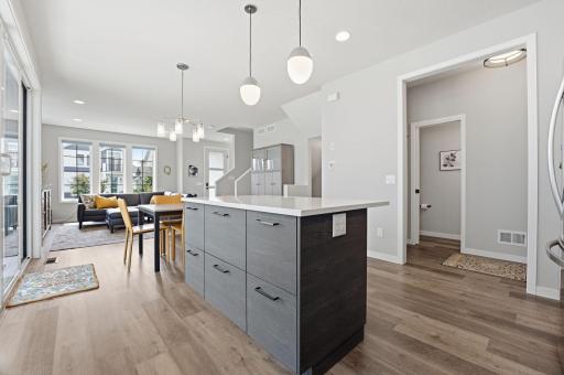 Additional storage can be in the island! Grab a stool and a coffee.