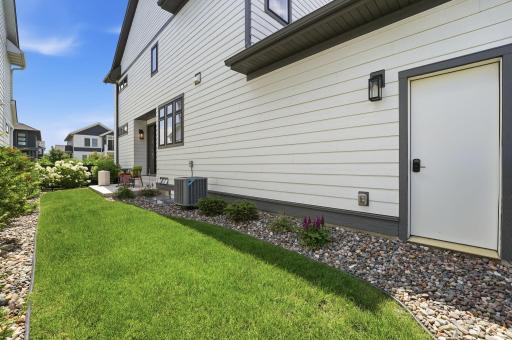 Service door to your insulated and heated two-car garage.
