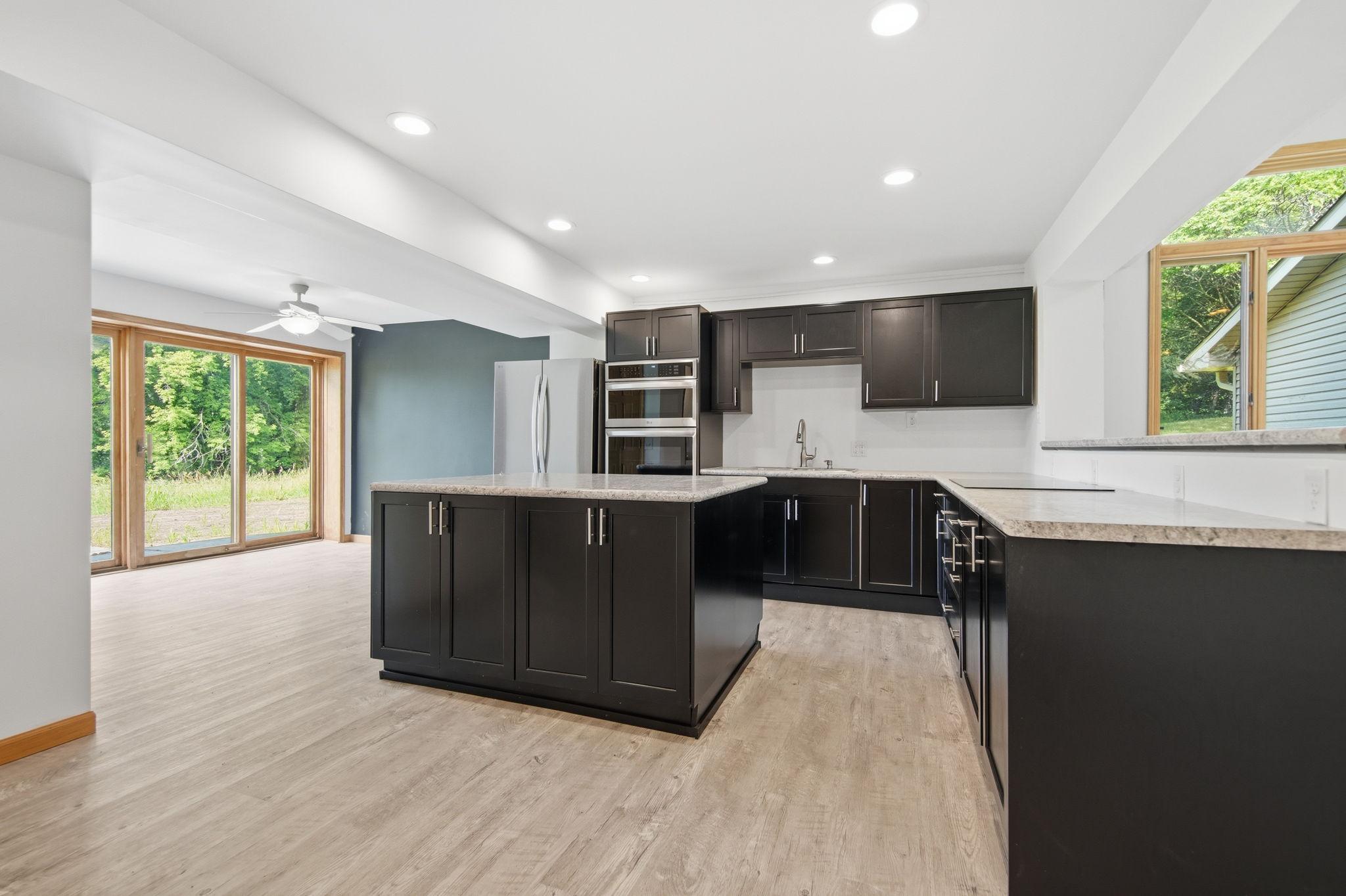 This kitchen features great cabinet storage space and plenty of countertop workspace. It was installed recently and has never been used by the owners.