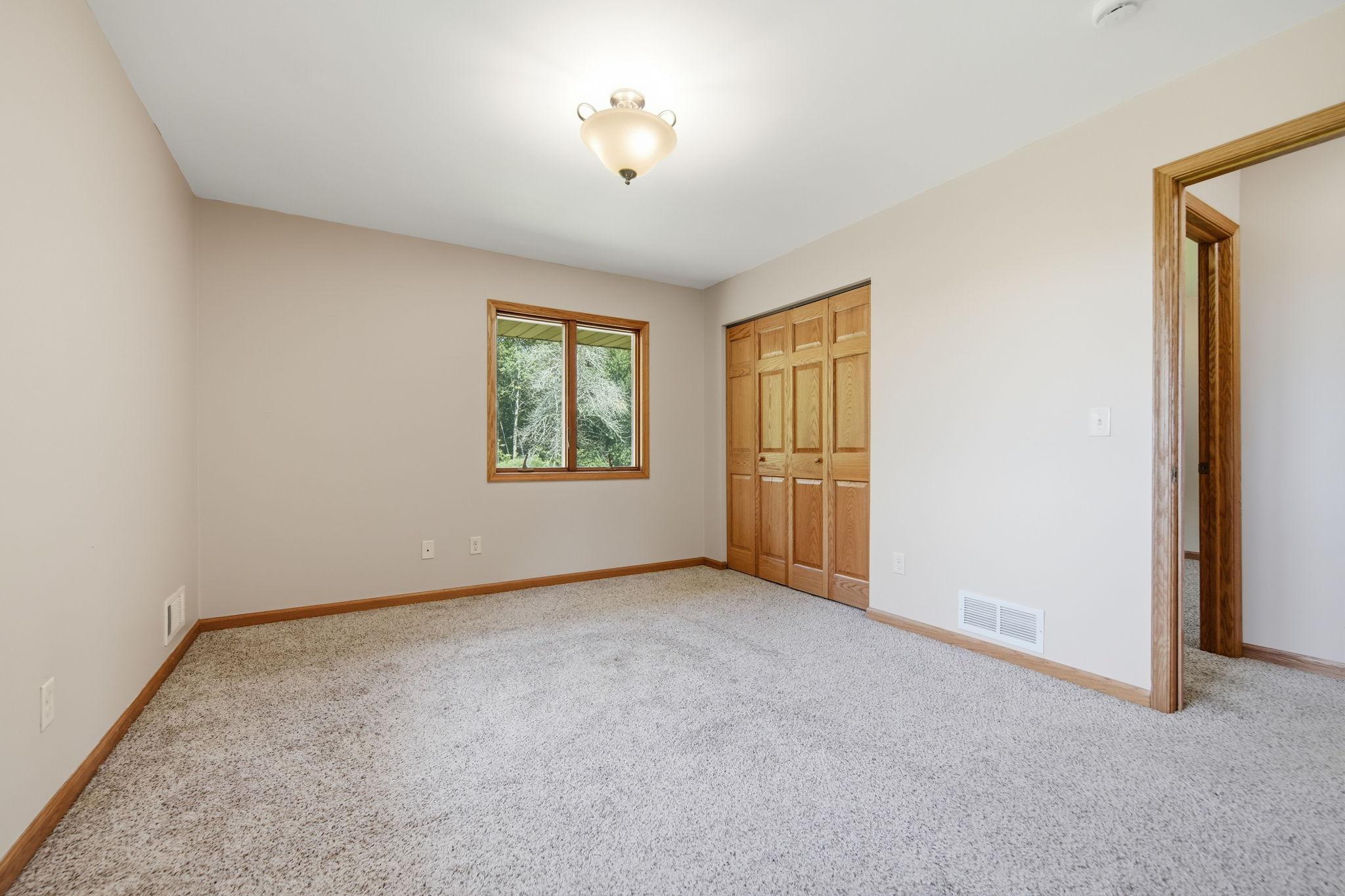 A king size bed will work in this room.