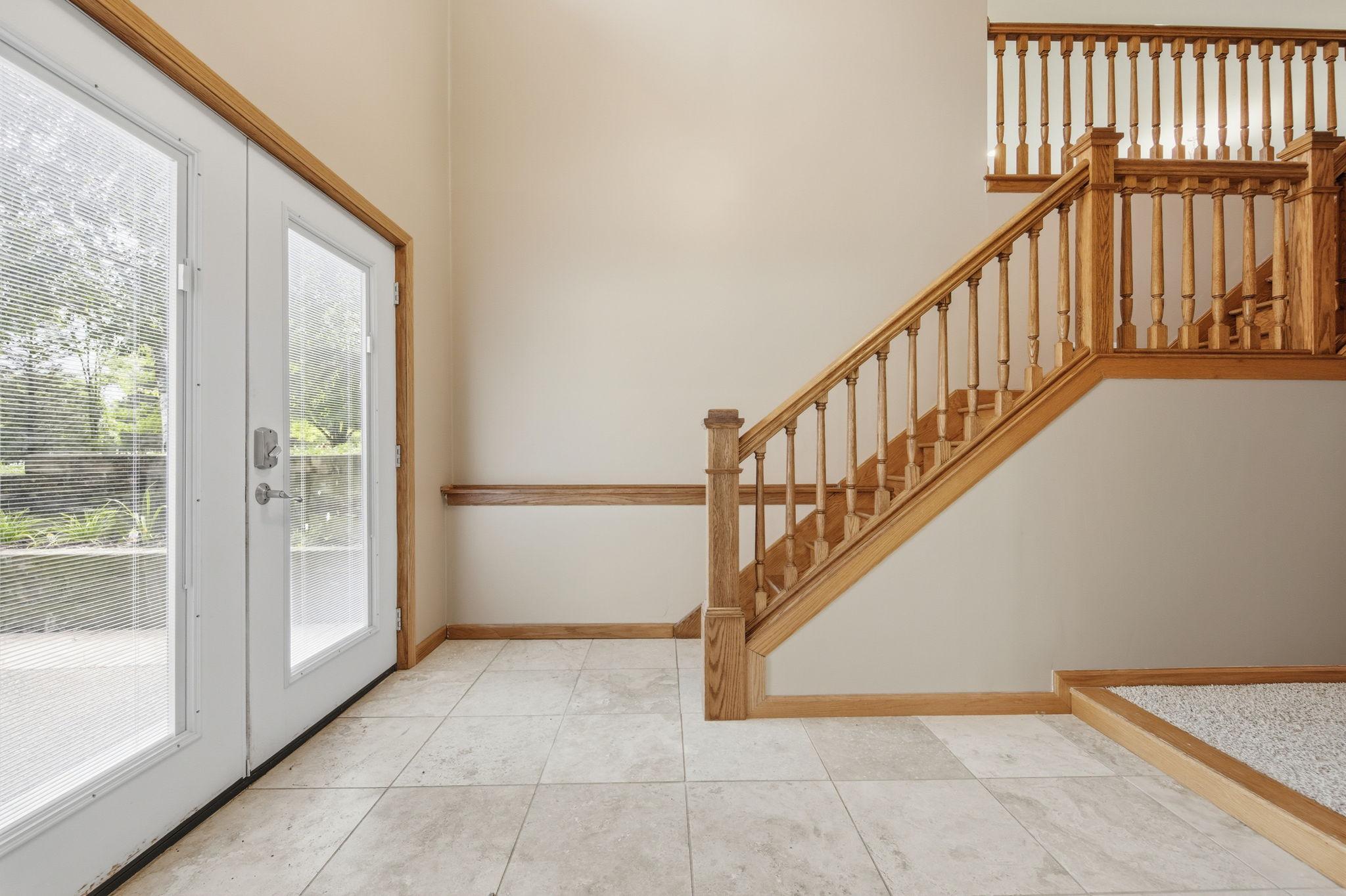 Aside from one small step up/down from the foyer and hall areas, the entry level lower-level of this home has no steps.