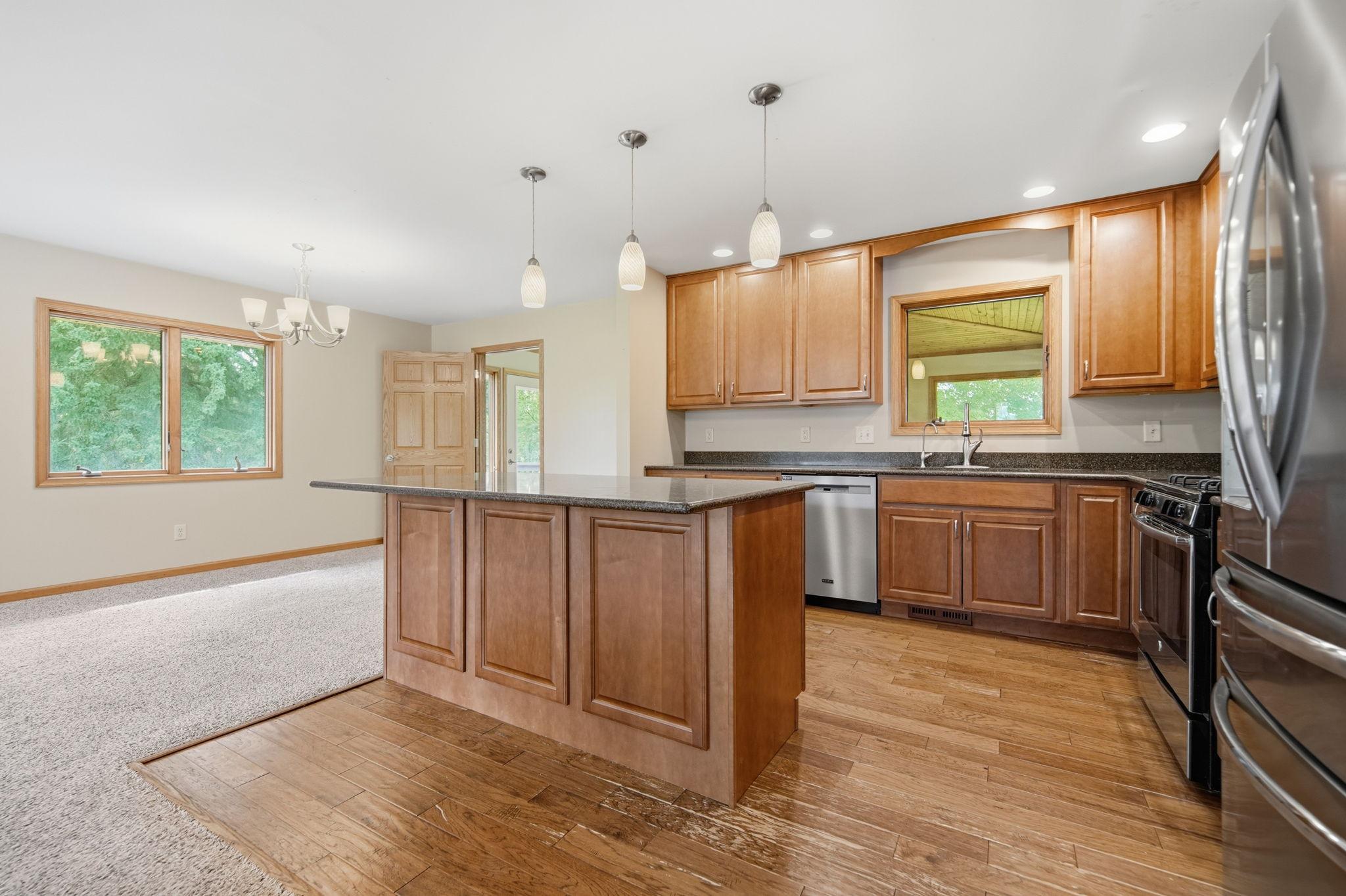 The kitchen features ample storage options.
