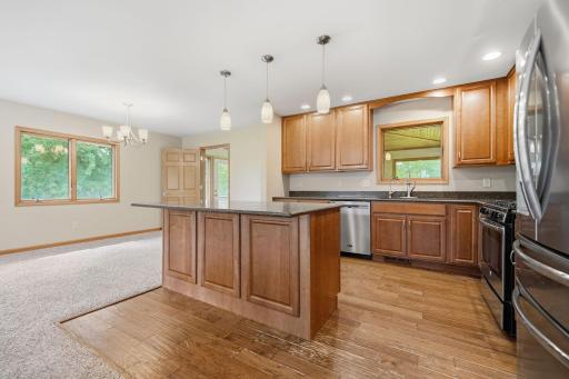 The kitchen features ample storage options.