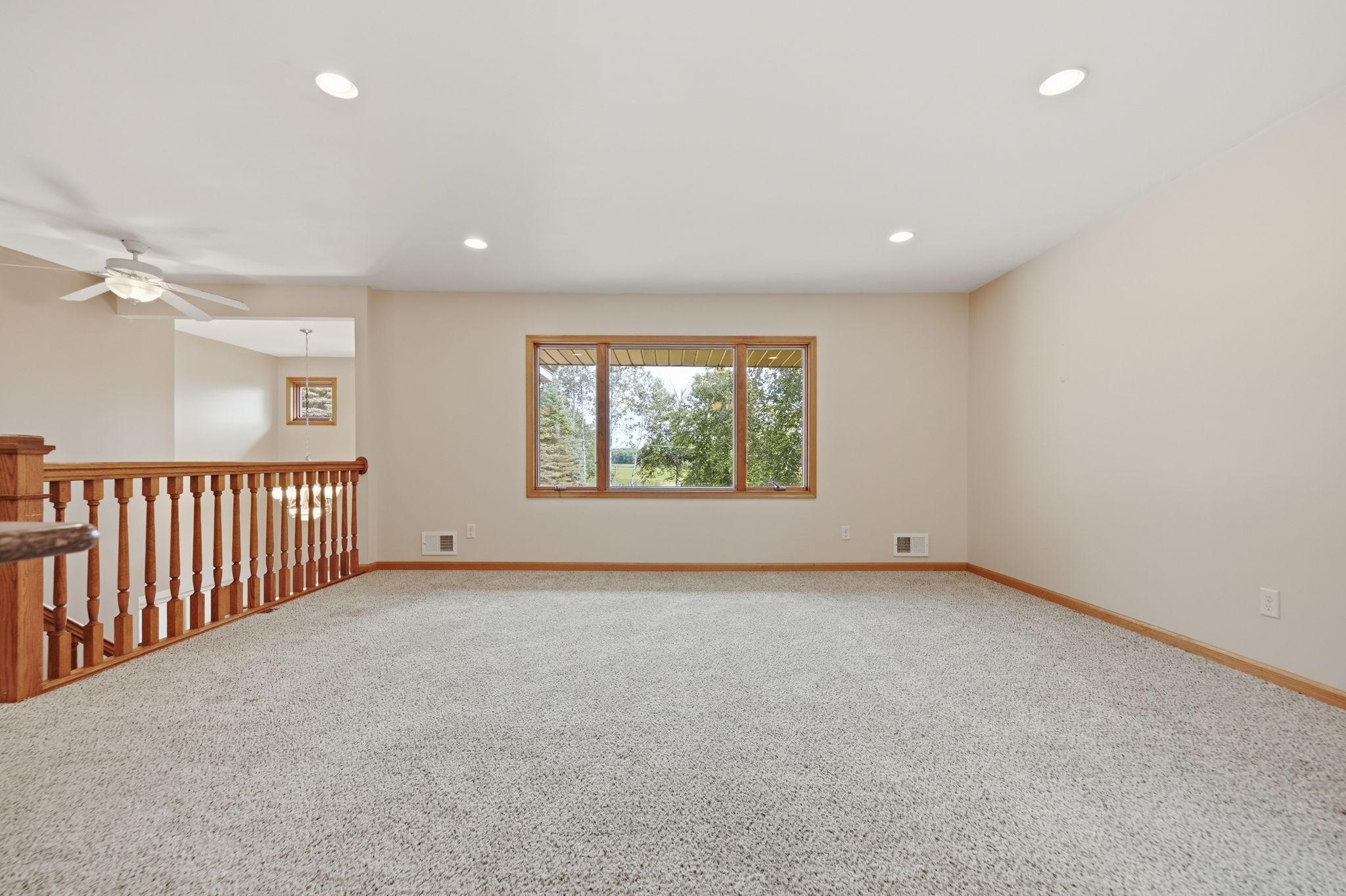 The living room will easily adapt to most any combination of furniture. The current owners had a piano, large couch and loveseat in this room with plenty of room to spare.