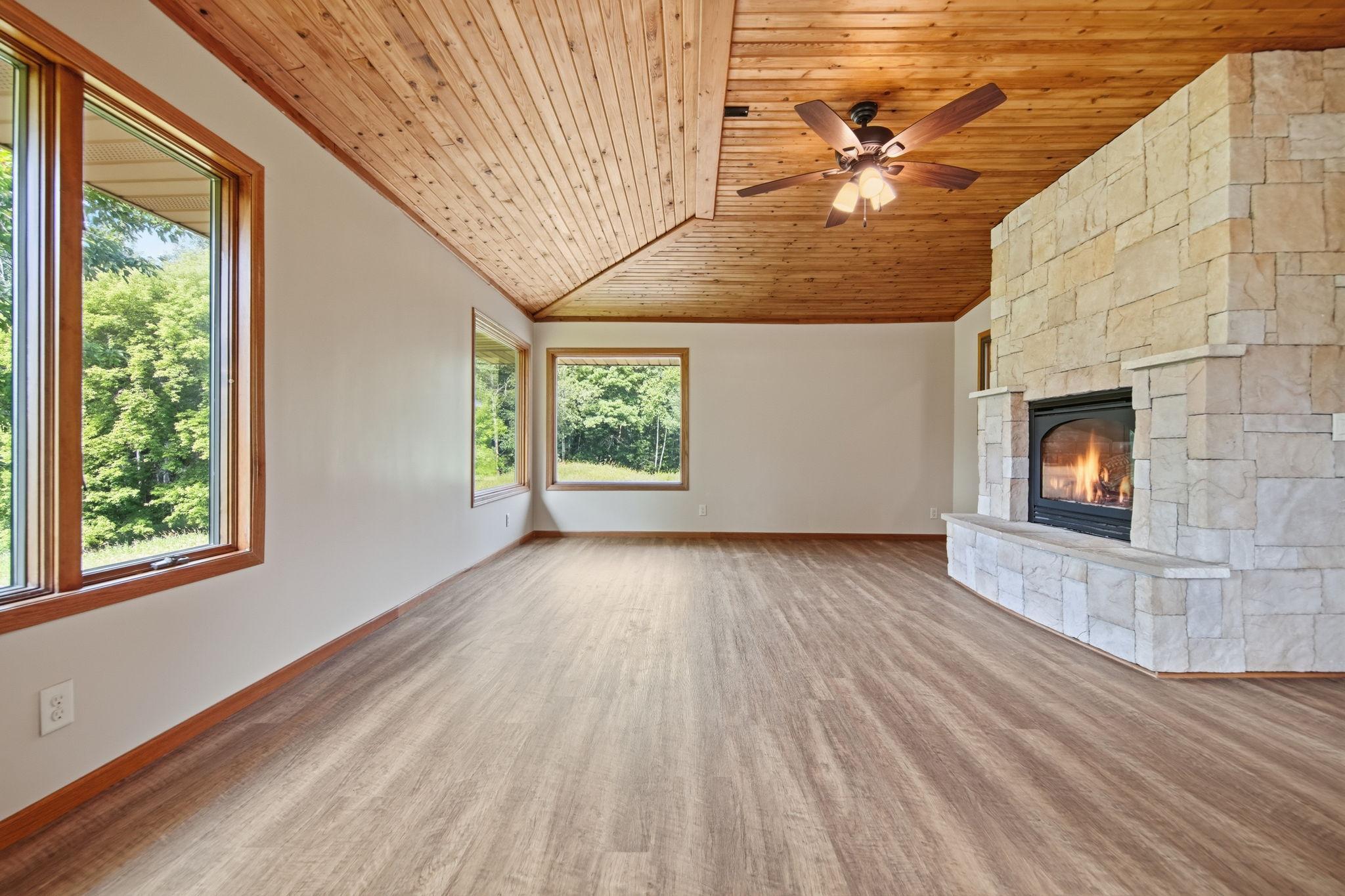 The four season porch features a nice gas fireplace for heat.