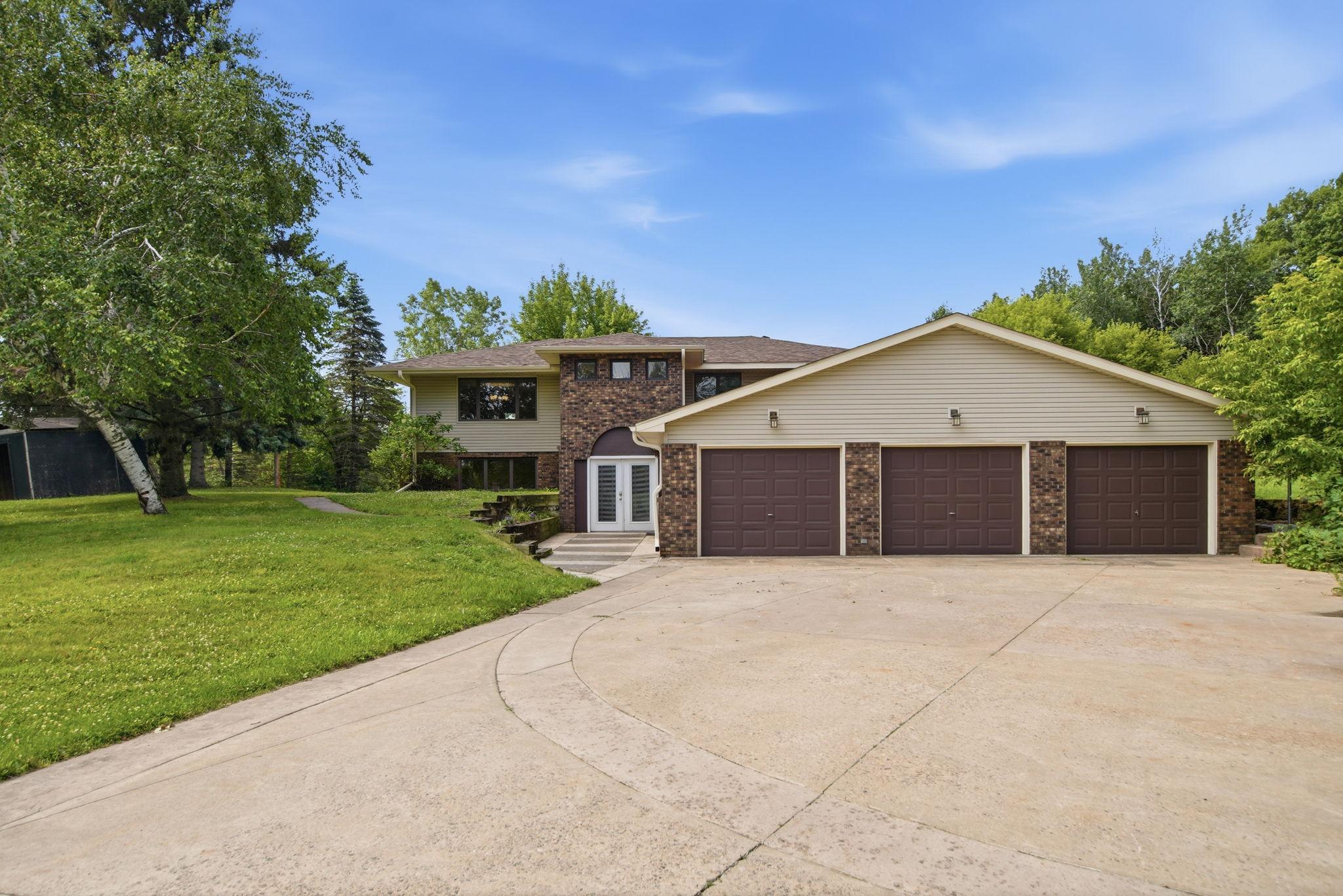 You'll appreciate a low maintenance oversized concrete driveway and a brand-new roof on this great country home.