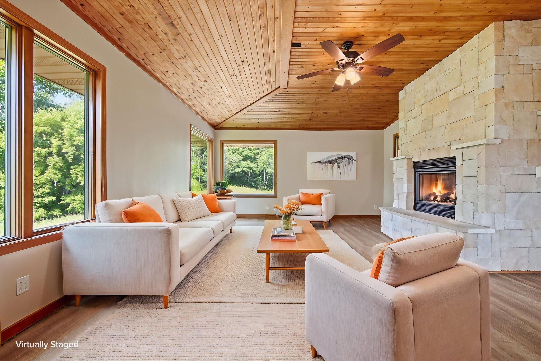 You'll love this home's four season porch. (Virtually staged)
