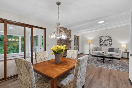 Main level: dining room/3 season porch/living room