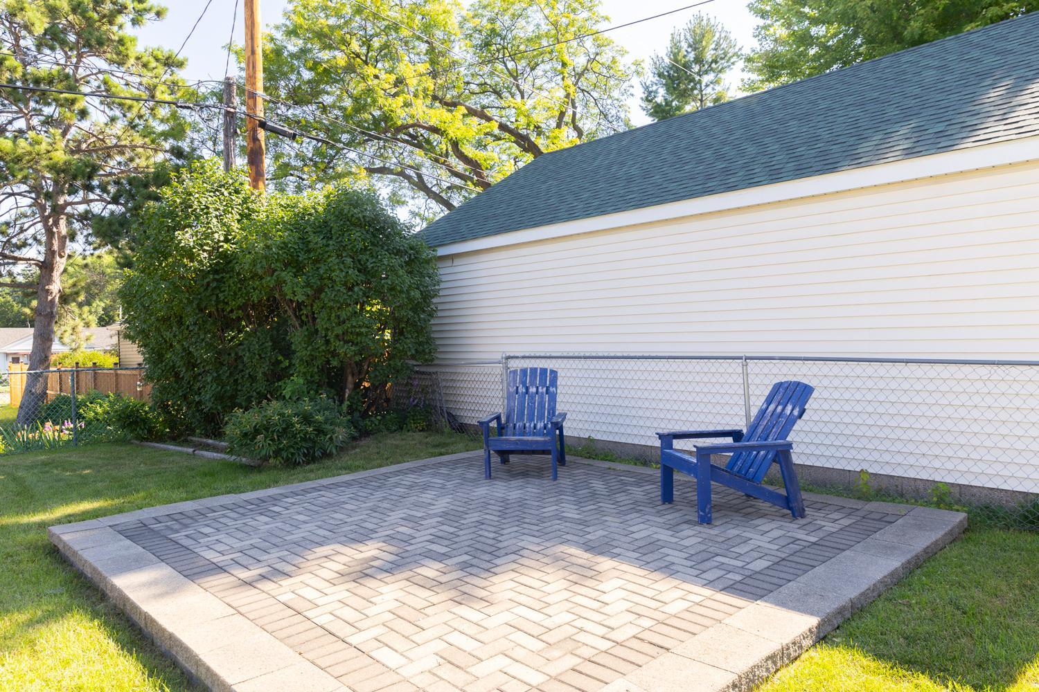 Fenced back yard also includes a beautiful paver Patio