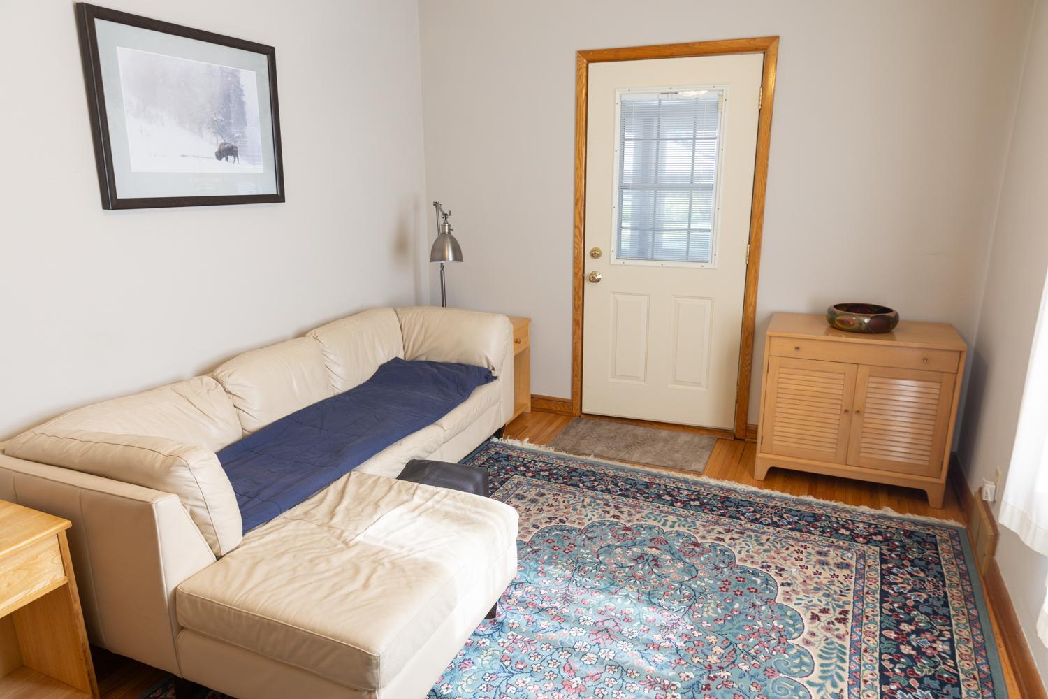 Bedroom Two on main level with door to 3-Season Porch