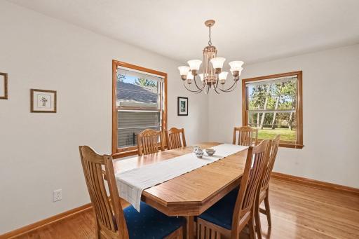 Note the dining room holds a large table.