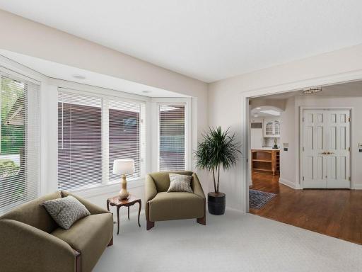 Virtual staging for this main floor den - nice sitting area.