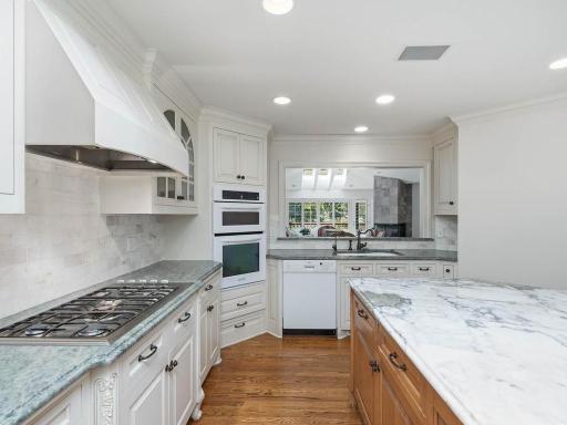 Sub zero refrigerator, gas cook top, wine cooler and built in oven/microwave.