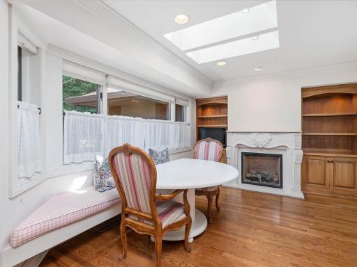 Kitchen bay window, with built in bench, cabinetry and gas fireplace. Skylight bring in even more natural light.