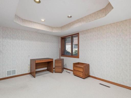 Bedroom #2 / home office with look out window and closet space.