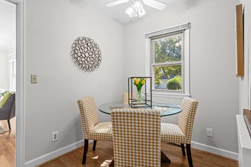 A breakfast nook with natural light shining in.
