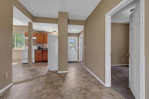 This view from the living room/dining area, back toward one of the front entries.