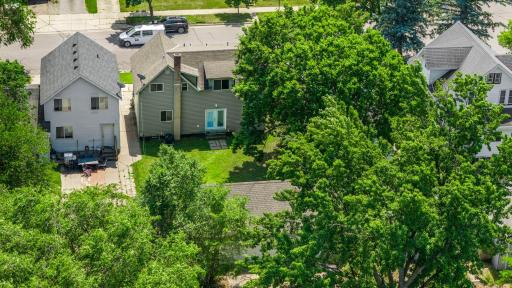 Tree canopy covers the 3 car detached garage with it's estimated 6 year old Timberland roof.