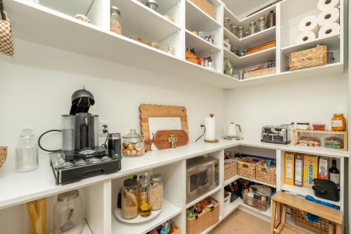 Butler's pantry/coffee bar with additional prep space and open shelving