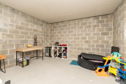 Additional unfinished room ready to become a office, workout room, or hobby space