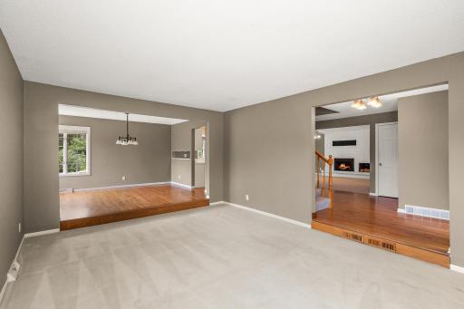 Living Room opens off of foyer and adjoining dining room.