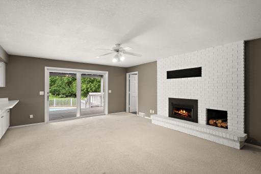 Deck access directly off family room with overlook of the pool.