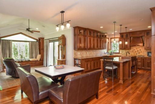 Informal Dining Room with View of Sunroom and Kitchen.jpg