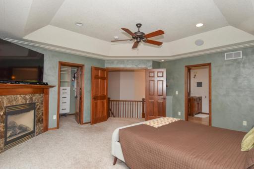 Luxurious Primary Bedroom with Fireplace and California Closet, Upper Level.jpg