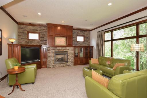 Living Room with Fireplace and Beautiful View of Yard.jpg
