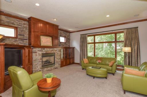 Living Room with Fireplace and Beautiful View of Yard, Main Level.jpg