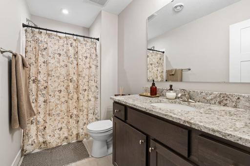 Lower level bath with beautiful granite top