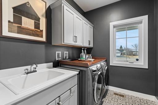 Well appointed laundry area just of the primary bedroom.