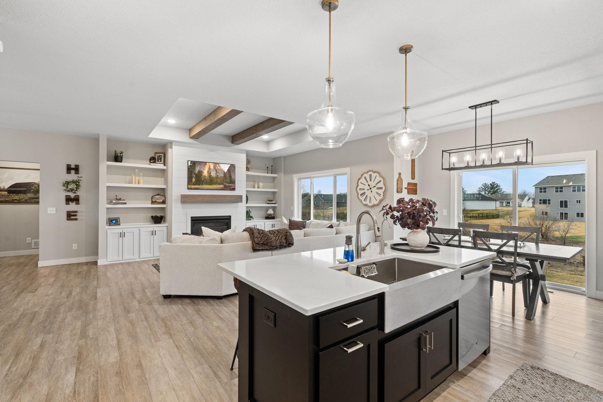 Island complete with farmhouse sink.