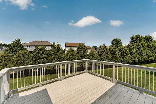 A single level, walkout townhome on a private wooded lot.