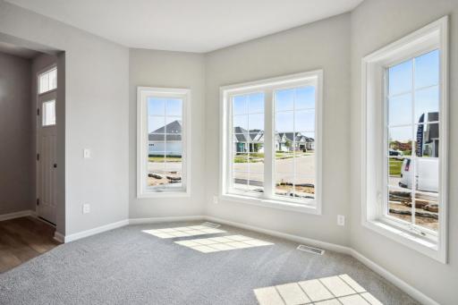 Front den. Photo is a completed home for illustrative purposes. Personalize this home with your chosen finishes.