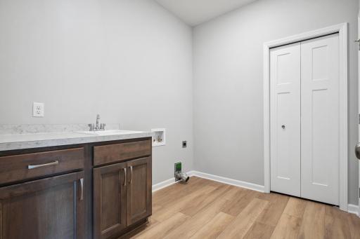 Laundry room. Photo is a completed home for illustrative purposes. Personalize this home with your chosen finishes.